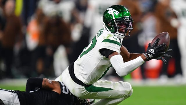 Jets' WR Garrett Wilson extends for extra yardage vs. the Raiders